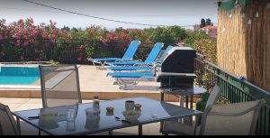 Sunloungers by pool